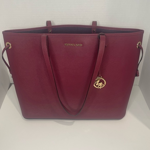Michael Kors Handbags - Michael Kors Jet Set Multifunction Saffiano Travel Tote Merlot Burgundy